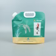 2kg黄小米袋+UV塑料复合+自立带吸